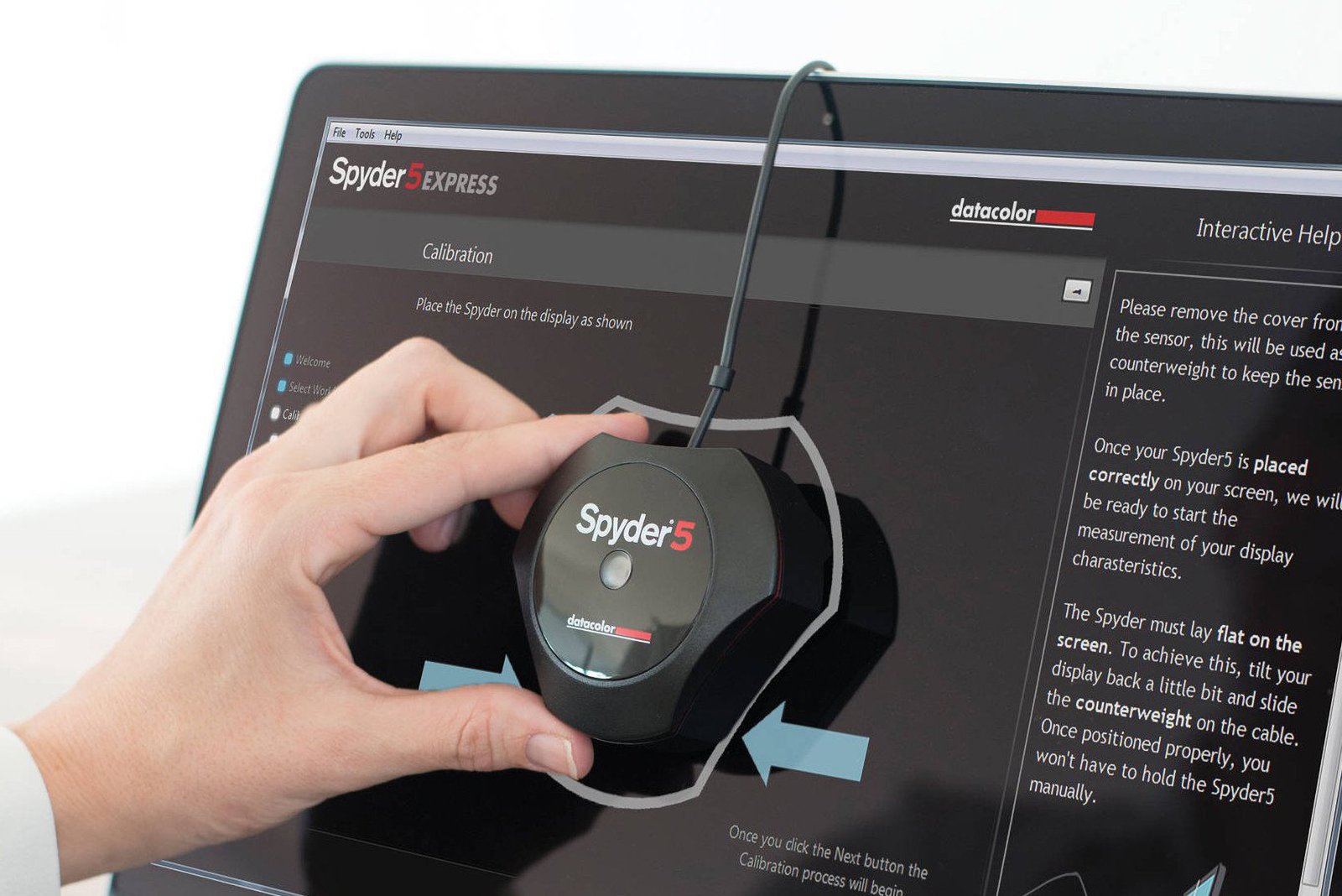 Spyder 5 in use, calibrating monitor