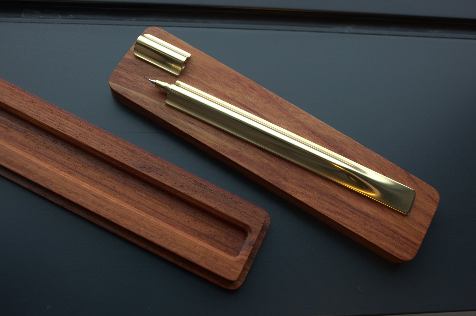 Bespoke brass pen from above, custom teak box