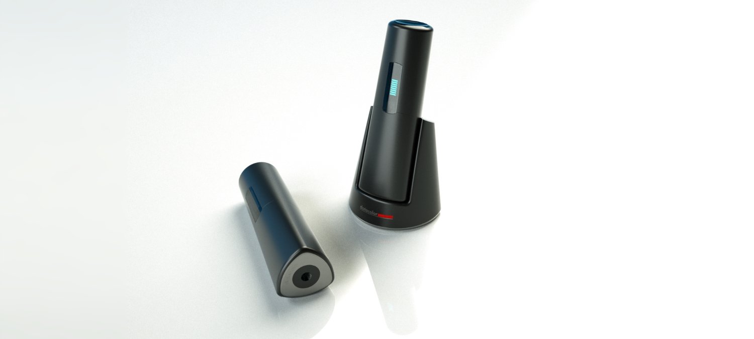 Handheld spectrophotometer in charging cradle